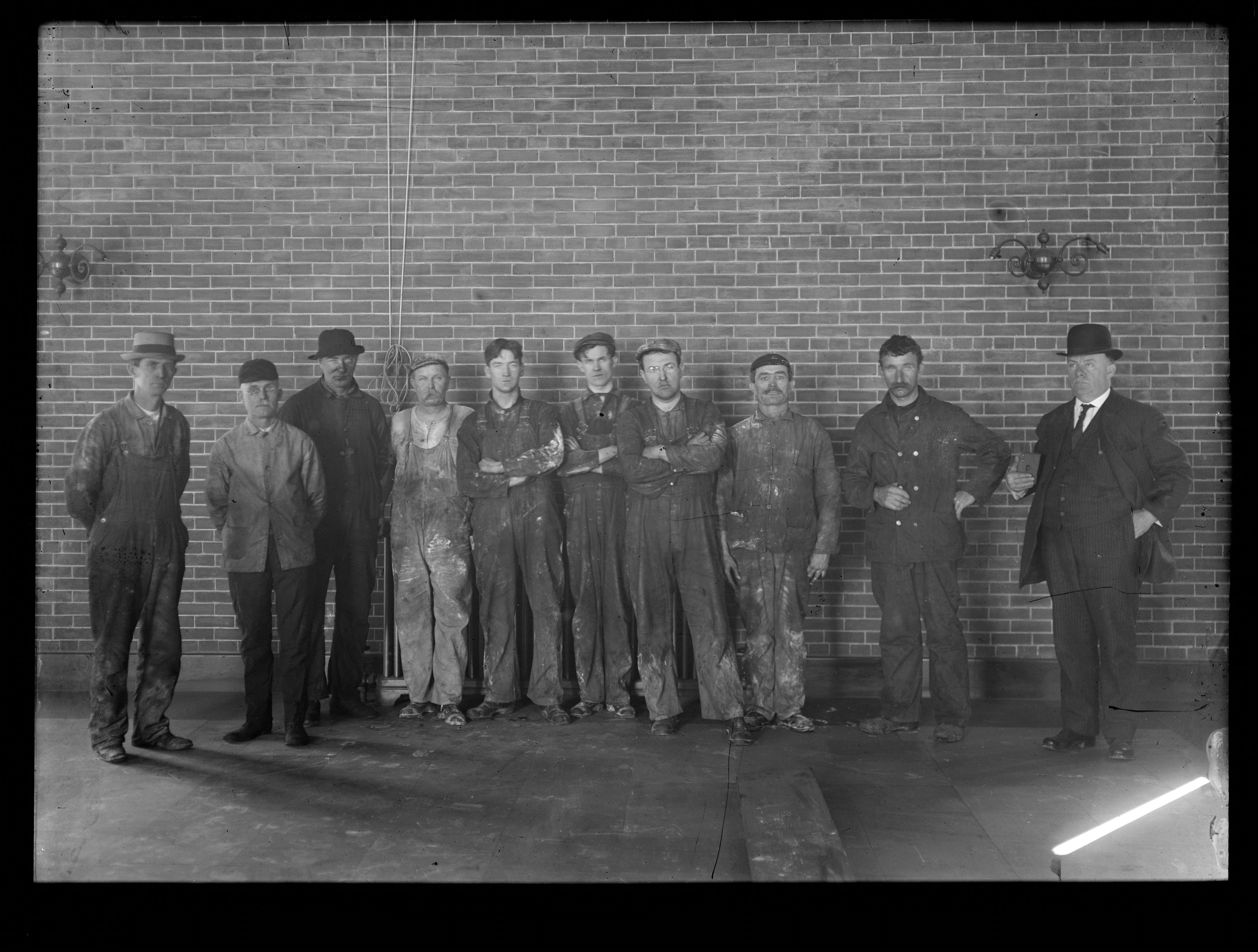 Portrait of Ten Men; Inside of a Pumping Station?, Mass., ca. 1900-1919