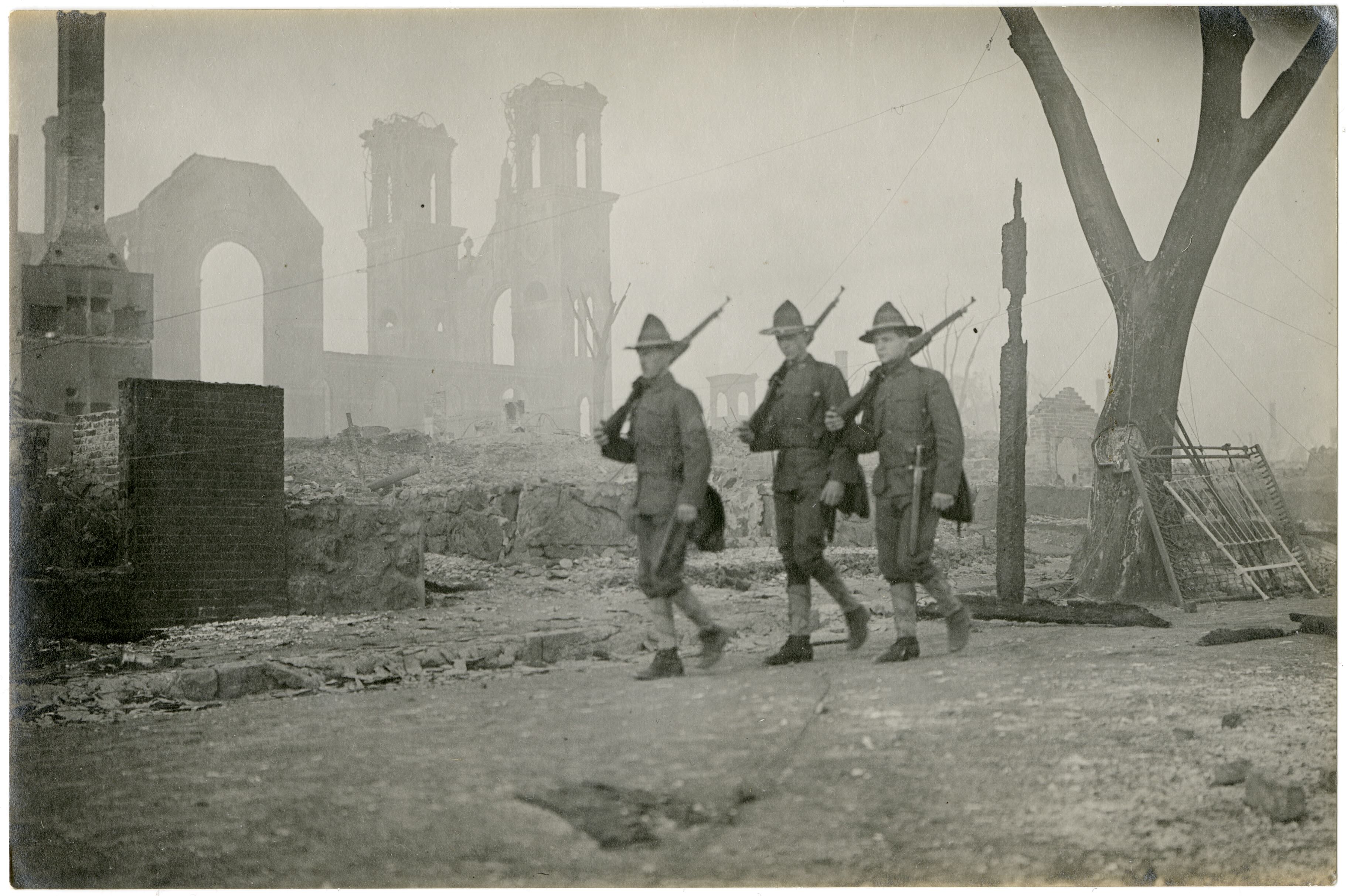 Militia patrolling in front of Saint Joseph's Church