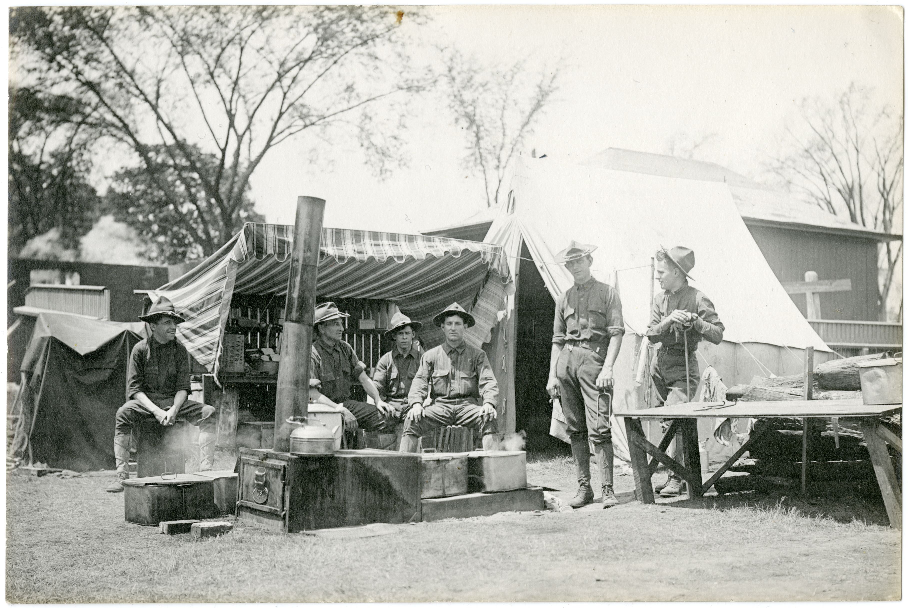 Militia members cooking in camp
