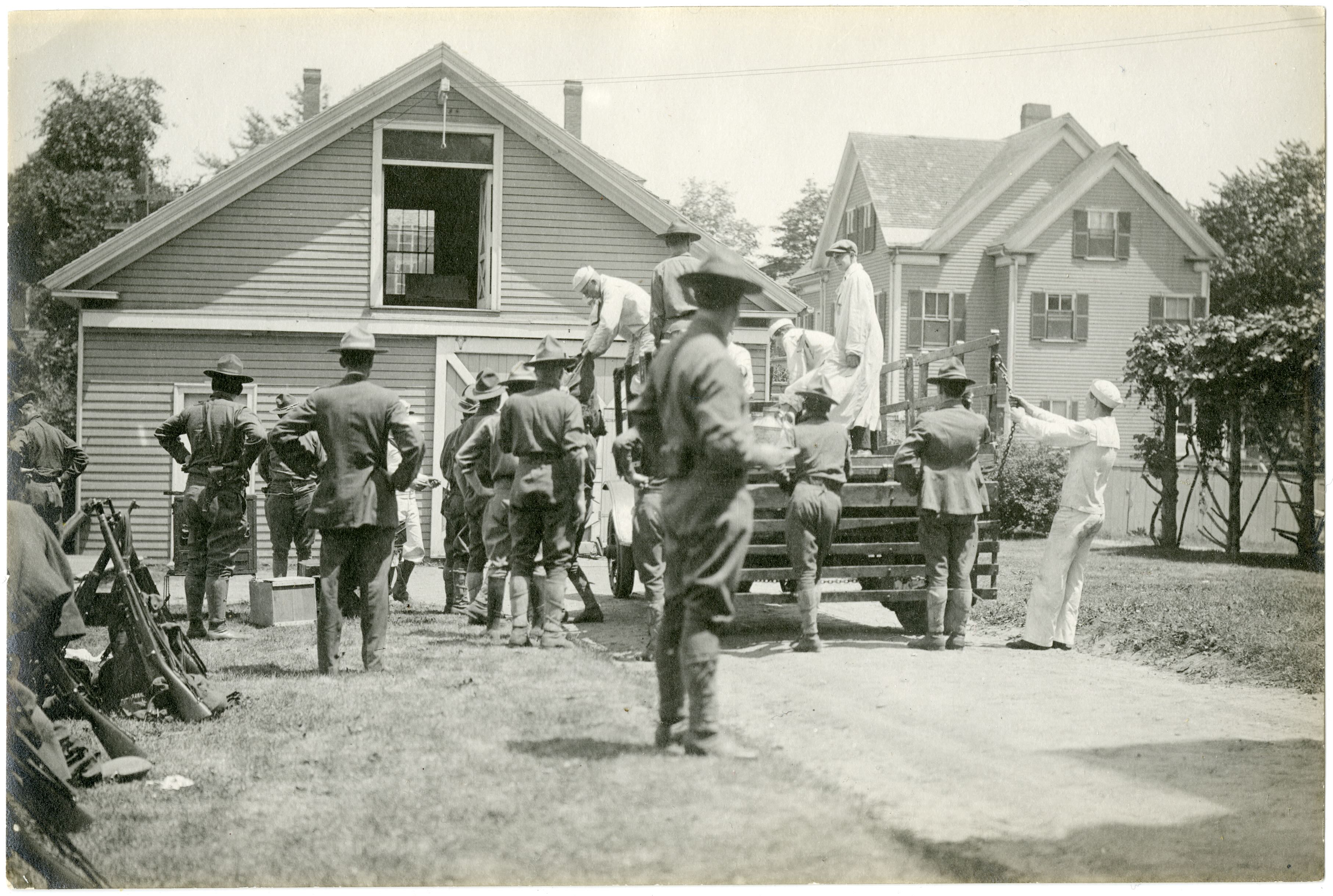 Militia members unloading supplies