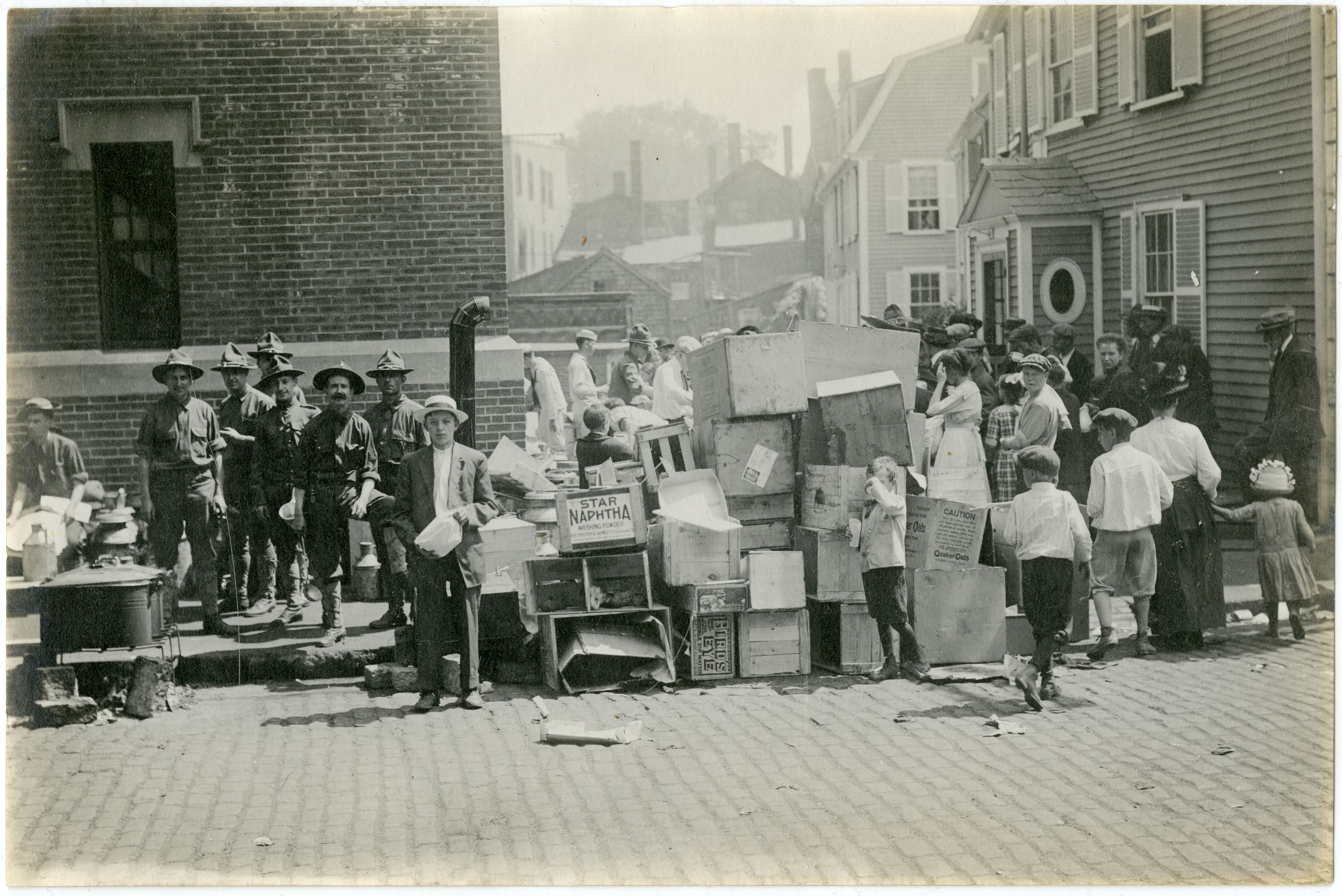 Refugees and their belongings on the street